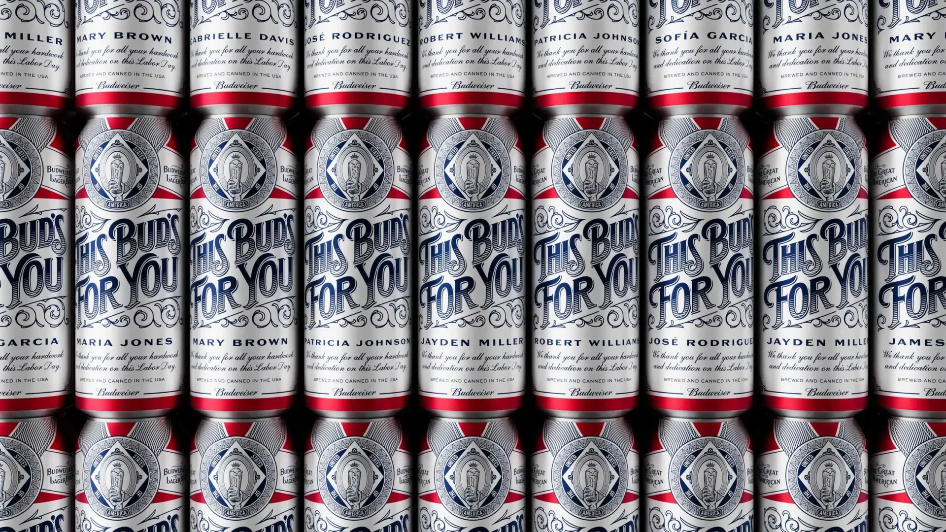 Grid of personalised Budweiser #RaiseABud cans, each scroll-script can printed with a different name